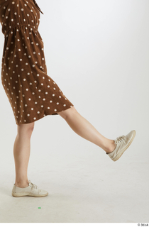 Aera  1 brown dots dress casual dressed flexing leg…